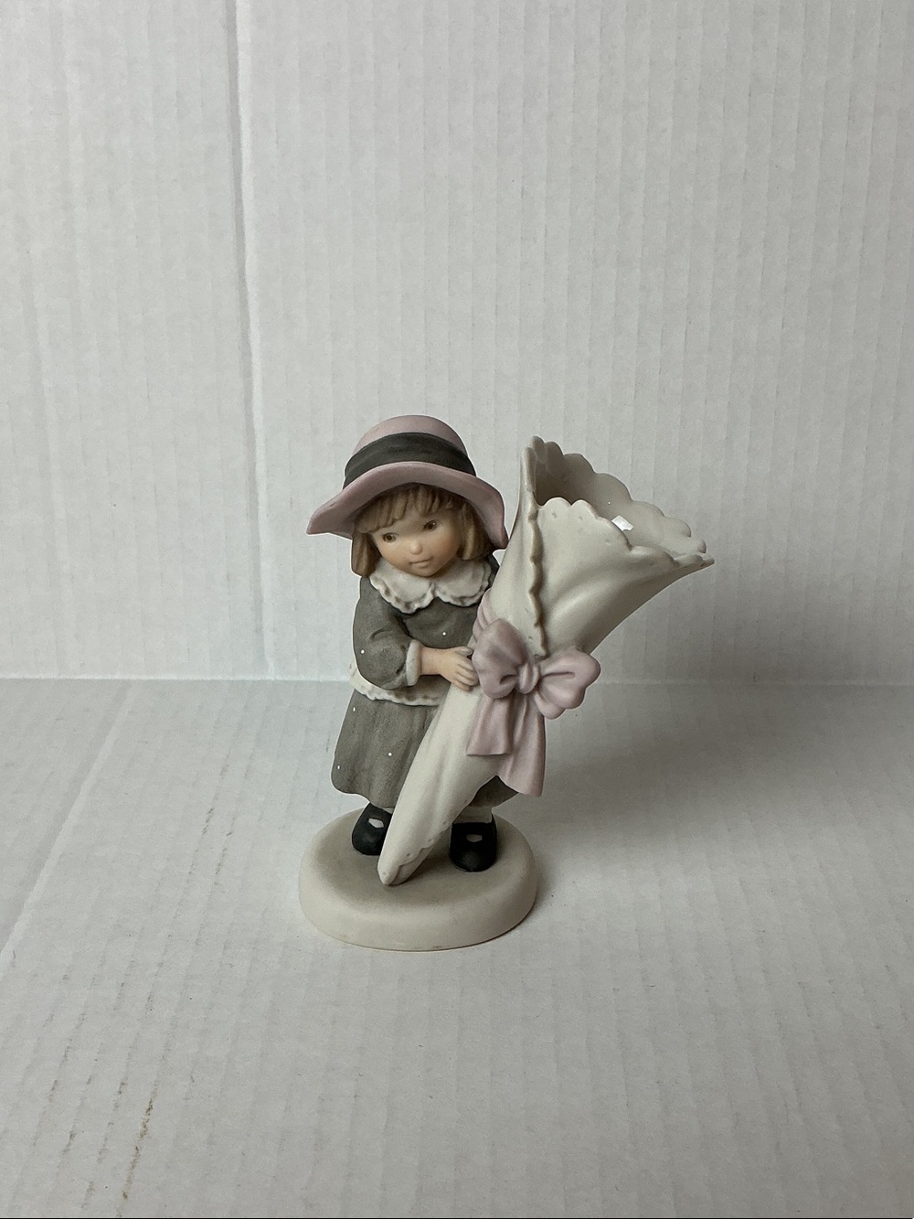 Enesco Girl Figurine with Pink Hat and Bow
